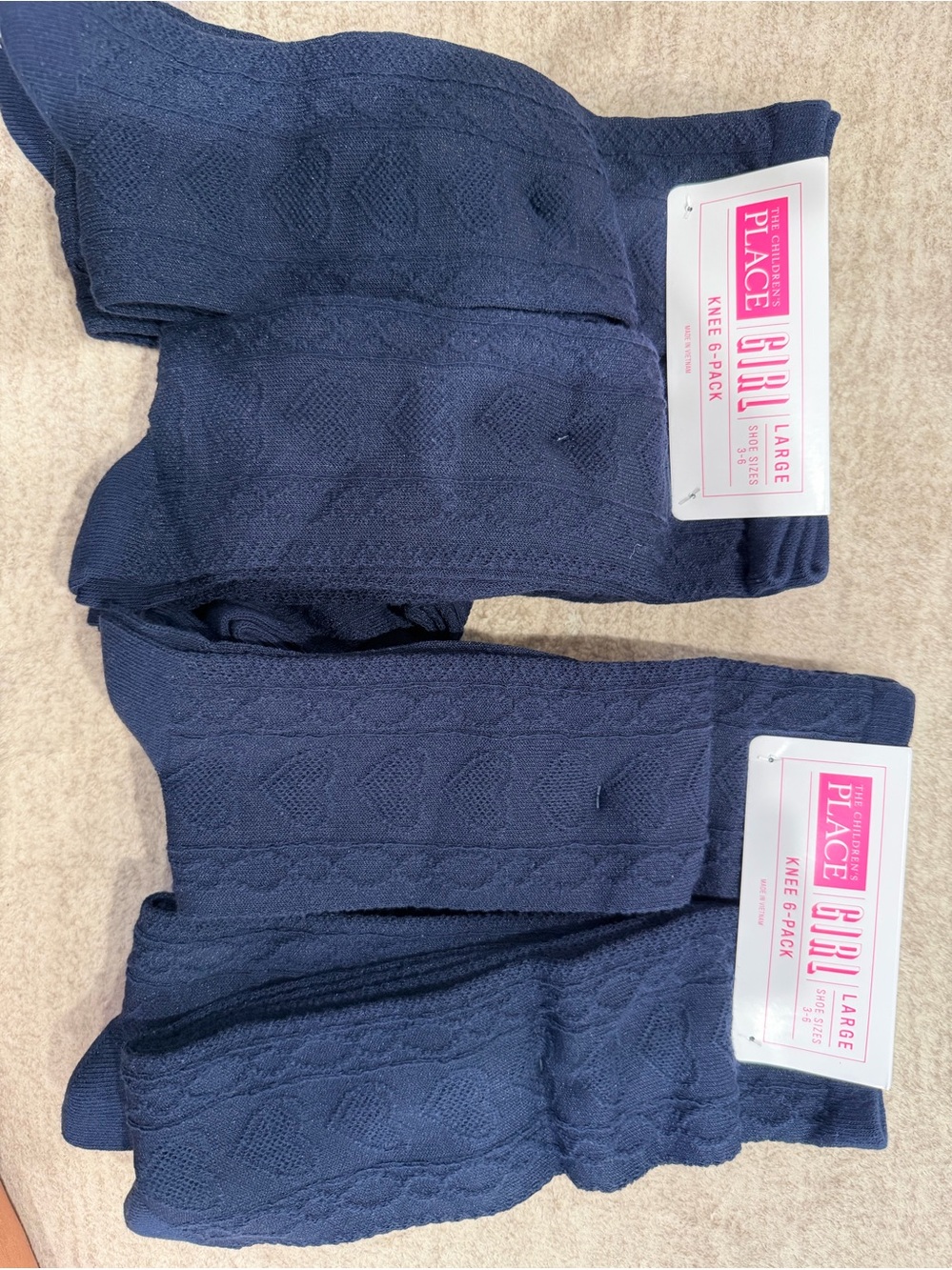 2 packs of Children’s Place Navy Cable Knit Knee-High Socks (Girl)